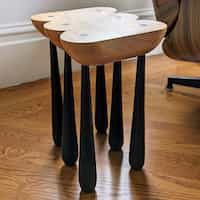 View of shaped side table with six legs