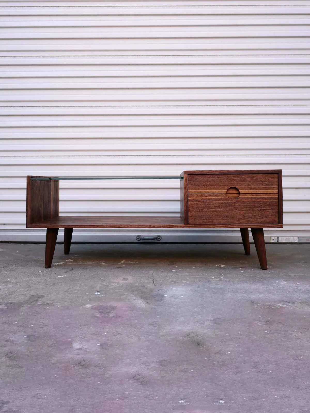 Front view of a walnut coffee table