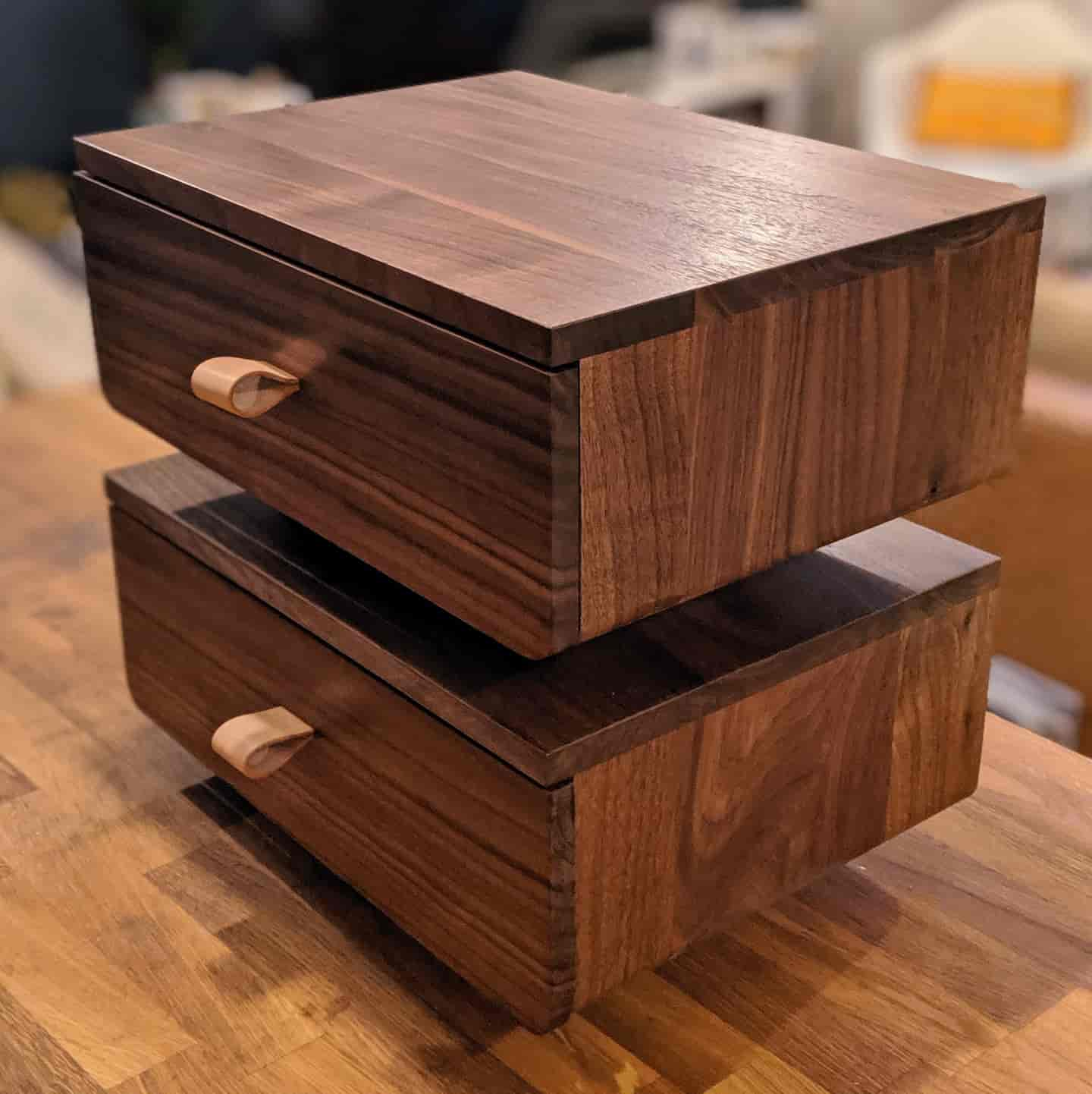 Three quarter view of floating side tables